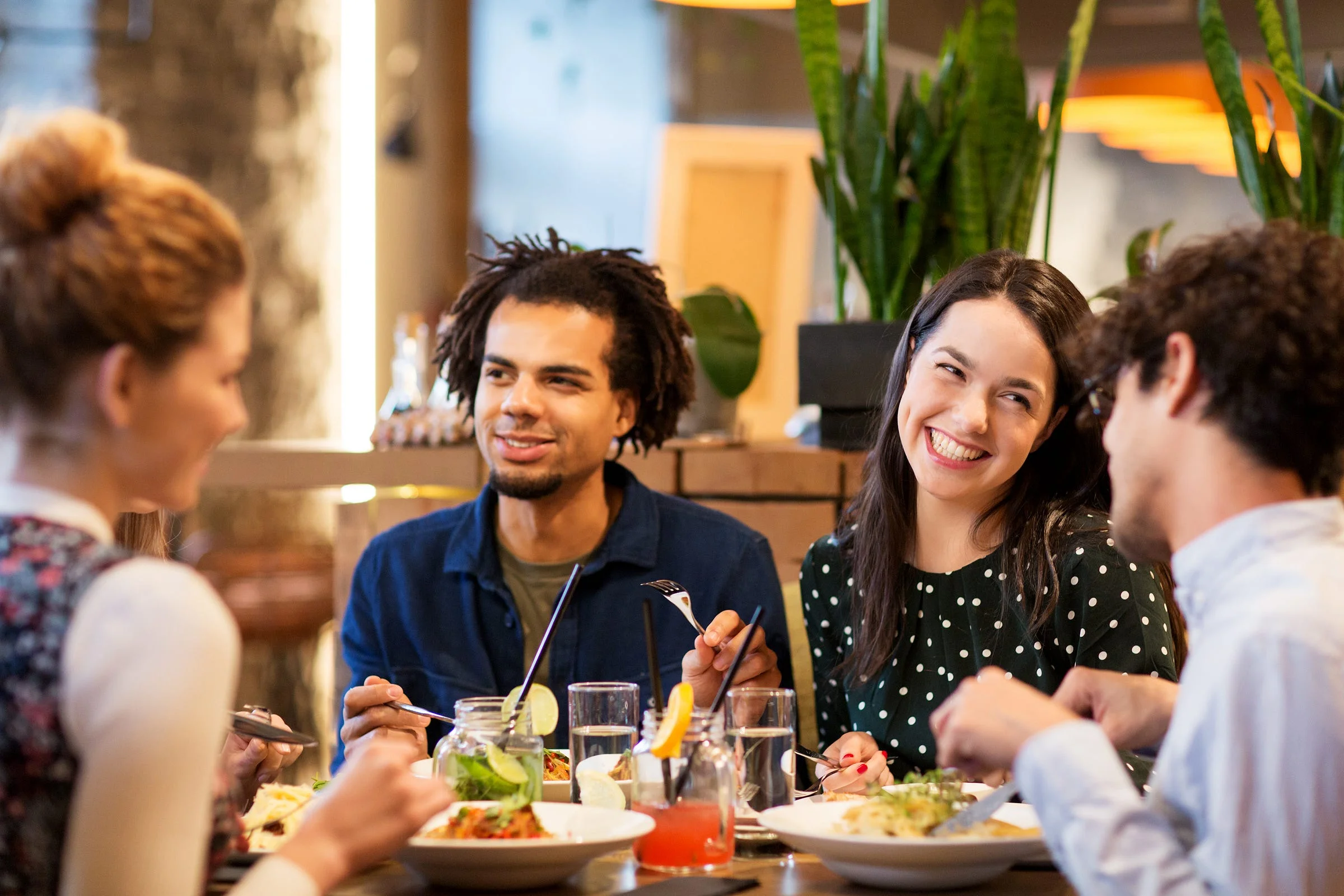 Diners enjoying a meal in a restaurant filled by video-driven discovery